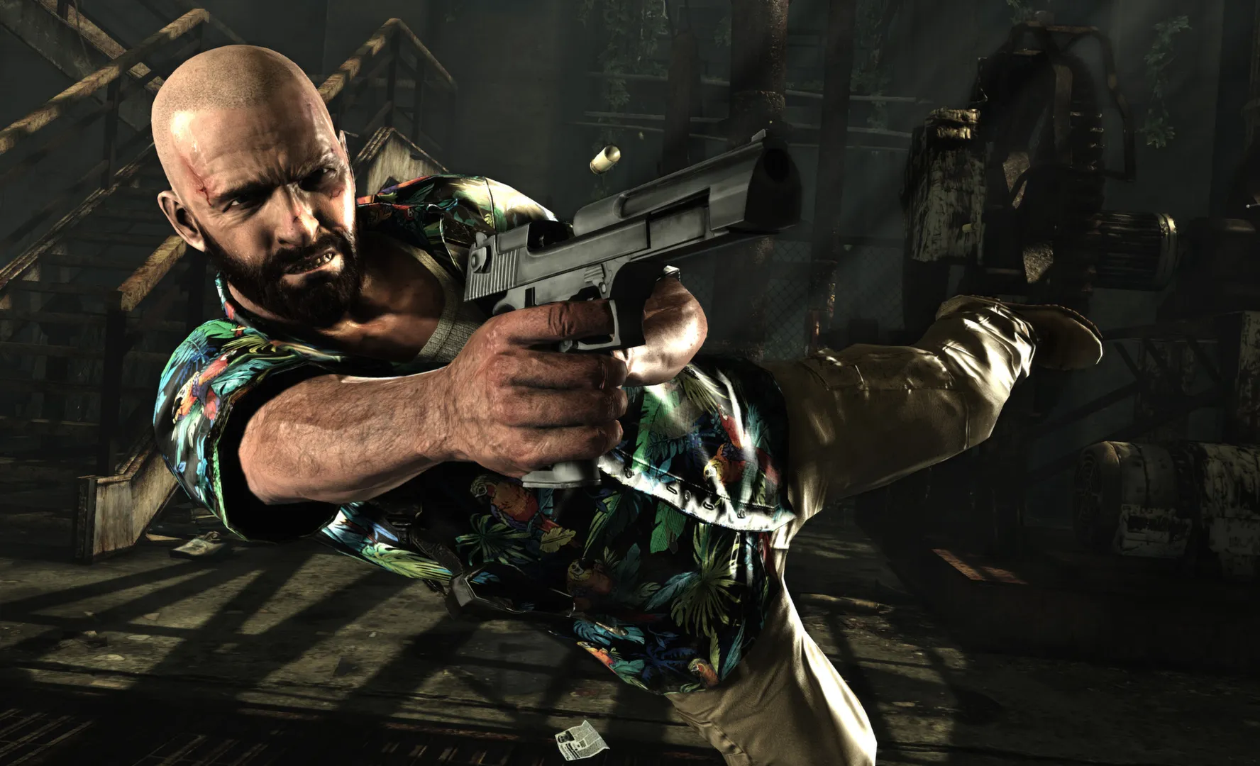 Max Payne, en chemise à fleurs, tire au pistolet pendant un plongeon dans Max Payne 3.