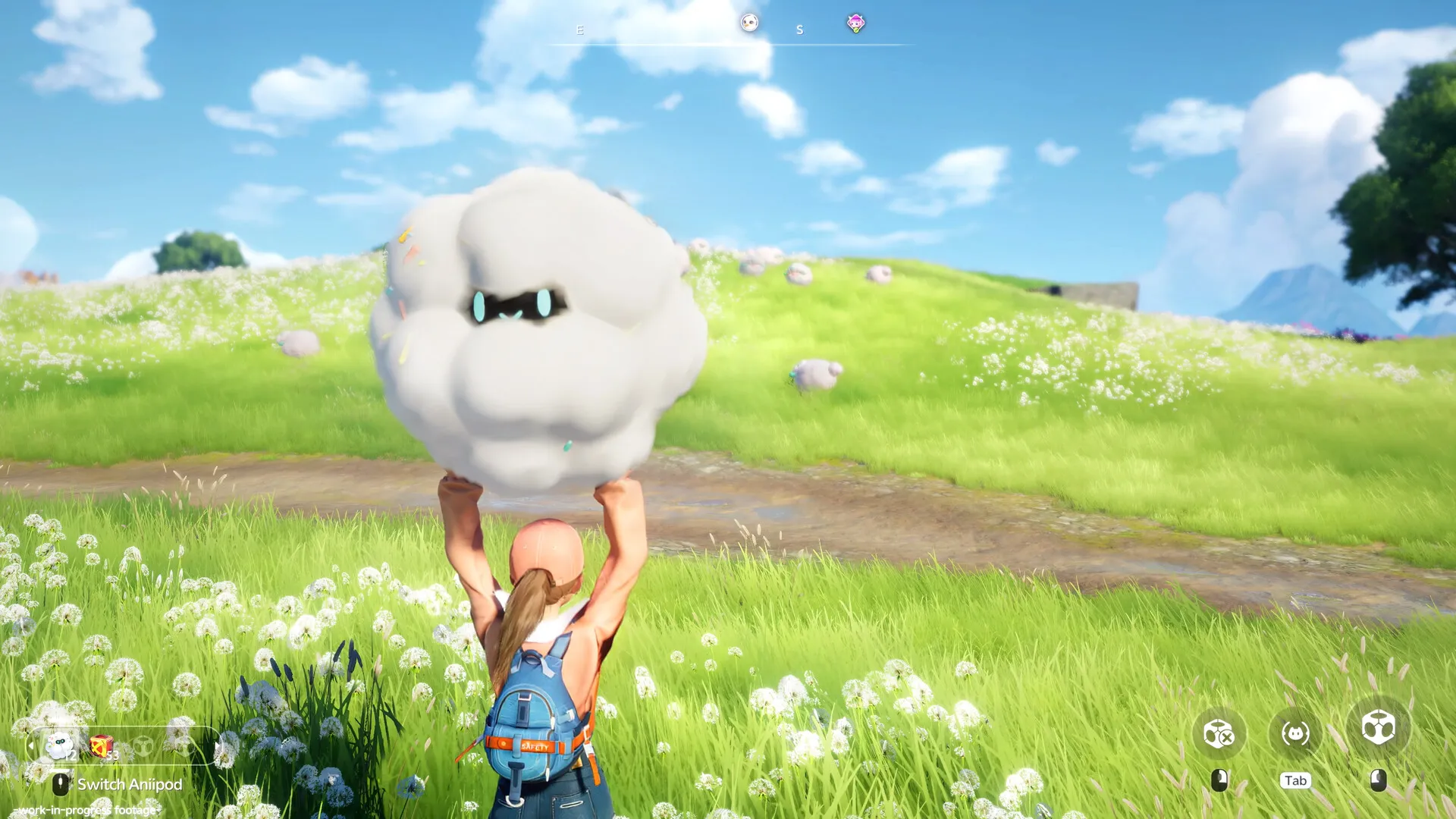 Une joueuse soulève une créature blanche dans une prairie d’Aniimo.
