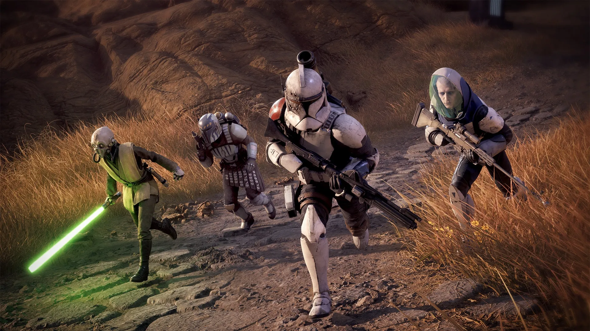 Quatre membres de l’escouade de Star Wars Zero Company avancent sur un terrain rocheux, dont un soldat clone et un personnage au sabre laser vert.