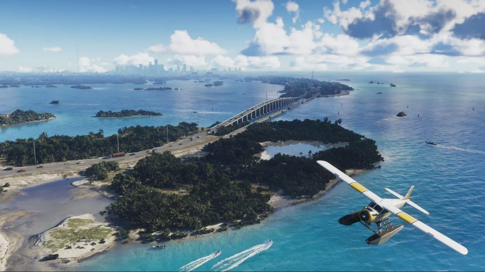 Vue aérienne des îles de Leonida Keys, avec un pont, de l’eau turquoise et un hydravion.