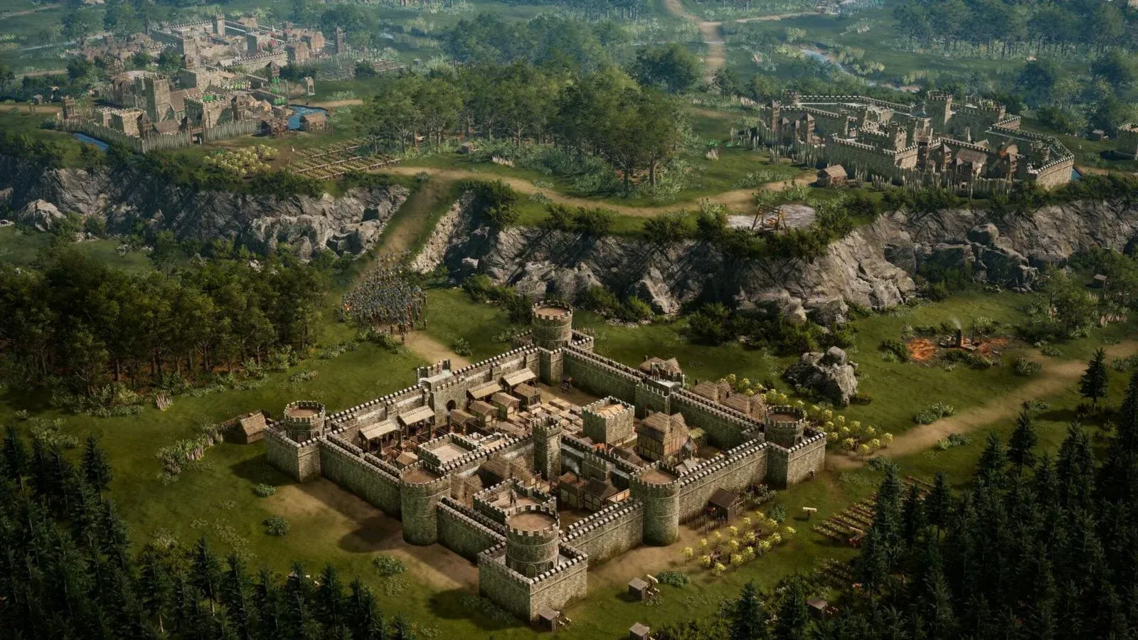 Une forteresse en pierre et en bois, entourée de champs et de forêts, vue du ciel dans Stronghold 4.